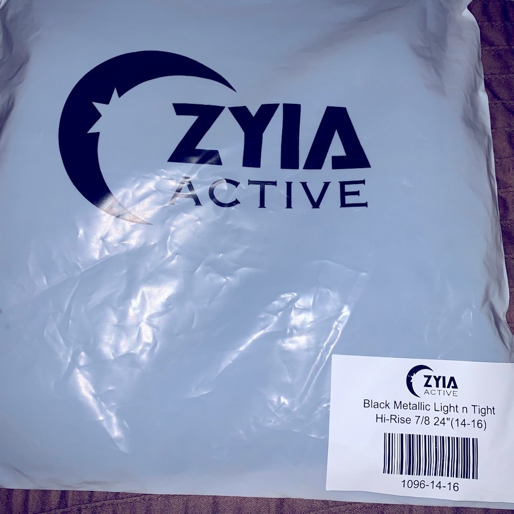 Zyia Black Metallics 7/8 Light N Tights size 14/16. Too big, went next size down